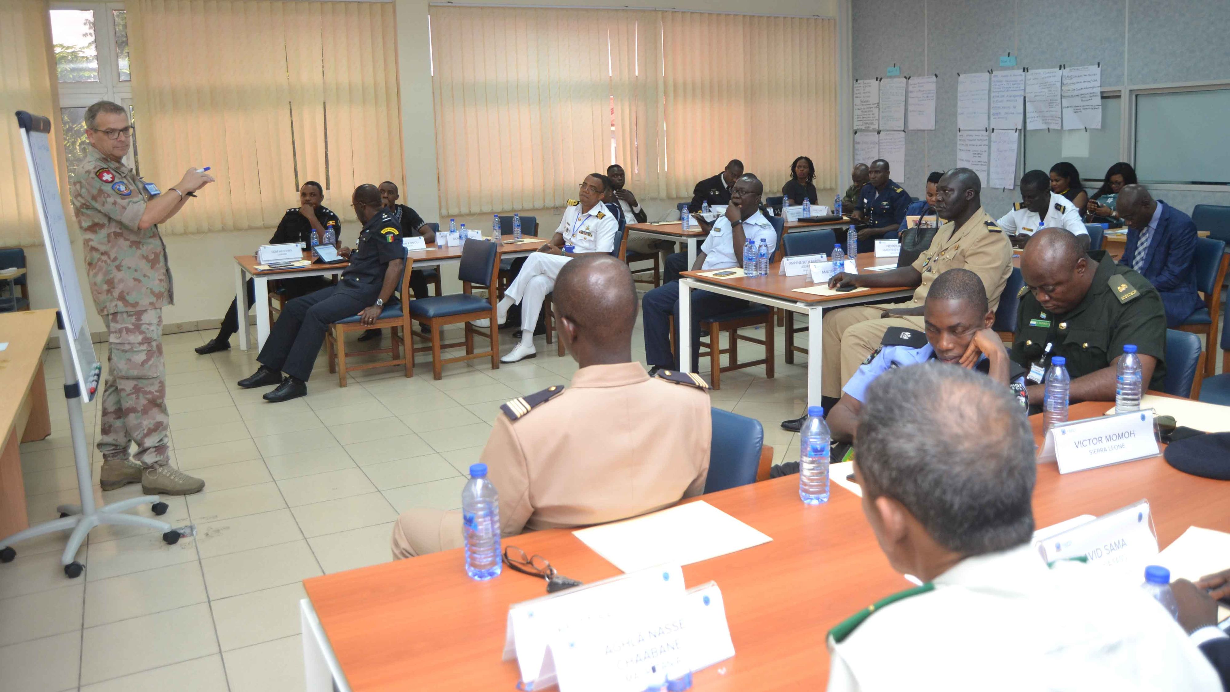 Im Kofi Annan International Peacekeeping Training Centre  (KAIPTC) in Ghana und am International Peace Support Training Centre (IPSTC) in Kenia stehen Schweizer Offiziere im Einsatz. In diesen internationalen  Ausbildungszentren sind sie in verschiedenen Funktionen tätig und tragen zur  zielgerichteten Ausbildung von Angehörigen internationaler Streitkräfte, Polizisten und Zivilisten im Bereich der Friedensförderung bei. Die Themenbereiche umfassen dabei beispielsweise Mediation, Sicherheitssektor-Reform, Konfliktanalyse, zivil-militärische Kooperation, Gender Equality, Schutz der Zivilbevölkerung, Kriegsvölkerrecht oder Planung und Logistik. Hierbei übernehmen die Schweizer Offiziere zum Beispiel planerische, organisatorische oder koordinative Aufgaben, leiten Kurse, evaluieren und analysieren Kursinhalte.